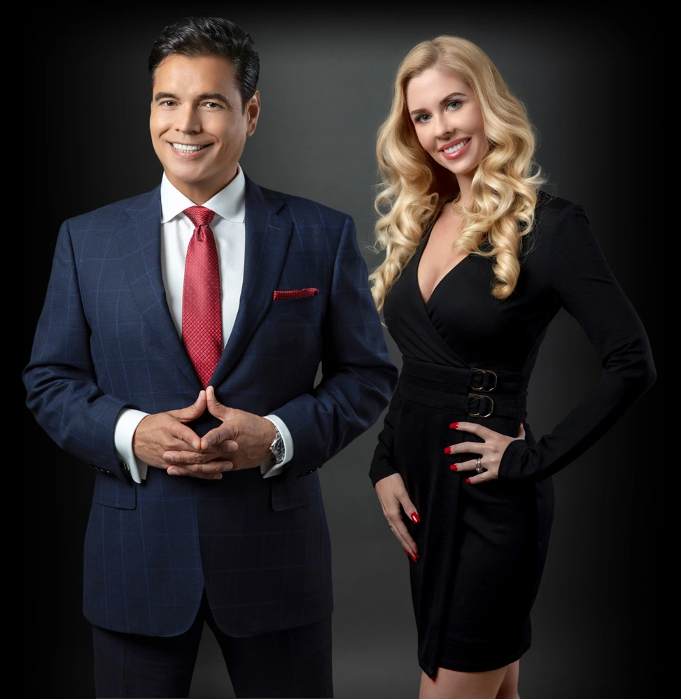 Meet Ivan & Jenna Larco – Your Orange County Real Estate Power Team Ivan Larco and Jenna Larco posing professionally in luxury attire, representing Orange County real estate expertise